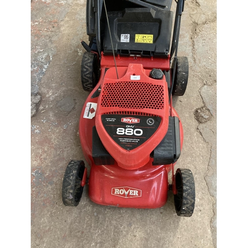 1268 - A black and red Rover 880 petrol lawnmower with grass collector