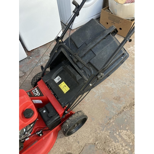 1268 - A black and red Rover 880 petrol lawnmower with grass collector