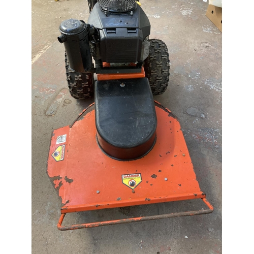 1269 - A black and orange DR all terrain petrol lawnmower with Kawasaki electric start engine