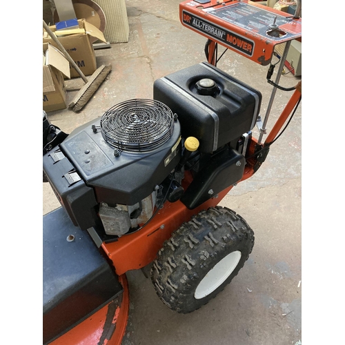 1269 - A black and orange DR all terrain petrol lawnmower with Kawasaki electric start engine