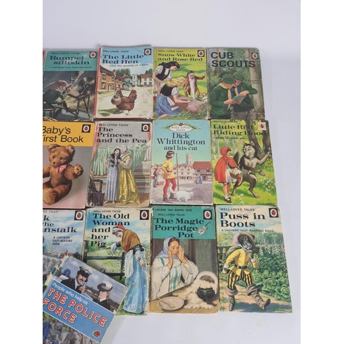 232A - A collection of vintage Ladybird books to include The Policeman, The Princess and The Pea, Puss in B... 