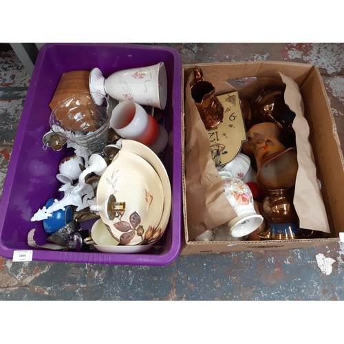 1364 - Two boxes containing various ceramics to include Wade Heath jug, Royal Winton vase, table lighter et... 