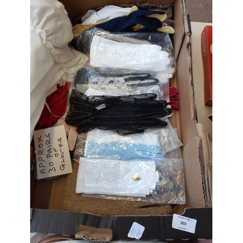 303 - A box containing various fashion accessories to include Wolsey Monte Carlo stockings, hats, approx. ... 