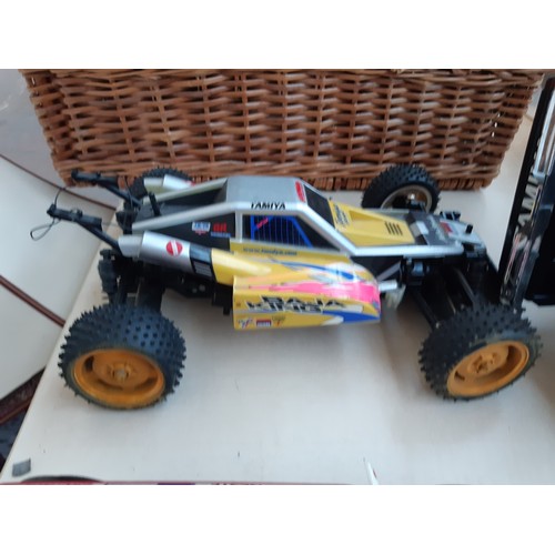 310 - Three various remote control cars