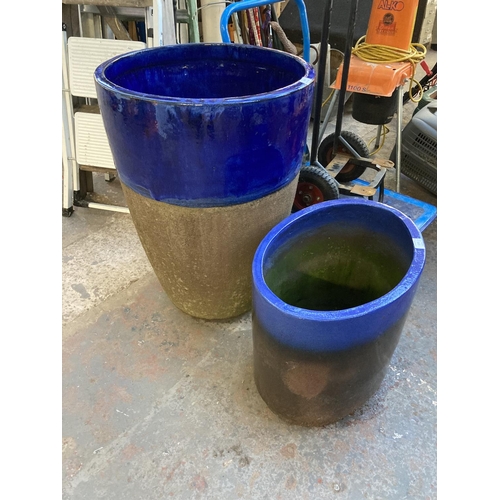 1300 - Two good quality blue glazed terracotta planters, one oval approx. 16