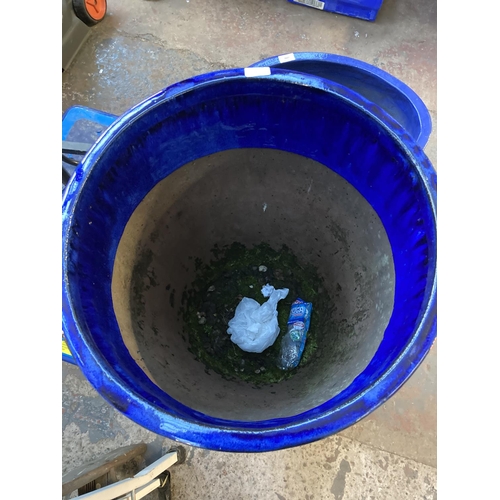 1300 - Two good quality blue glazed terracotta planters, one oval approx. 16