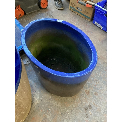 1300 - Two good quality blue glazed terracotta planters, one oval approx. 16