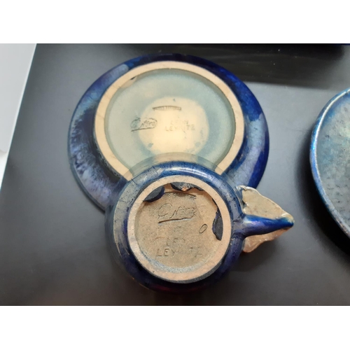 103 - A Leon Leyritz of France blue studio pottery five piece tea set comprising teapot, two cups and two ... 