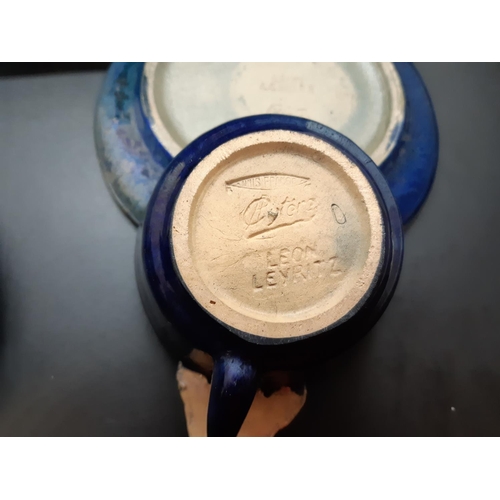 103 - A Leon Leyritz of France blue studio pottery five piece tea set comprising teapot, two cups and two ... 