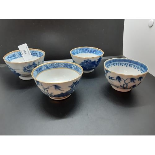 108 - Four 19th century blue and white tea bowls, three having gilded rims