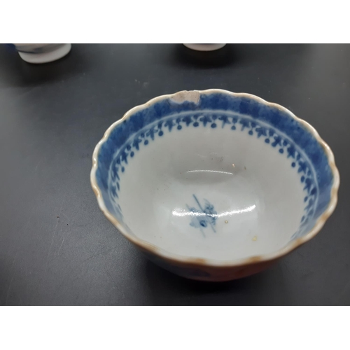108 - Four 19th century blue and white tea bowls, three having gilded rims