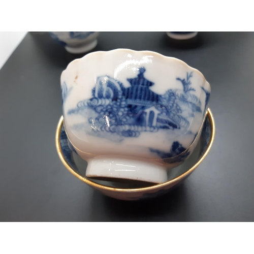 108 - Four 19th century blue and white tea bowls, three having gilded rims
