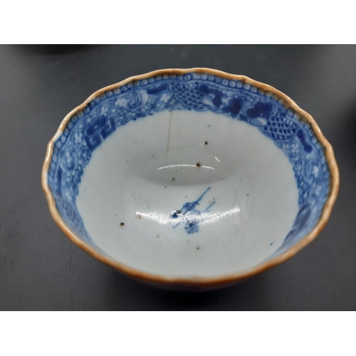 108 - Four 19th century blue and white tea bowls, three having gilded rims