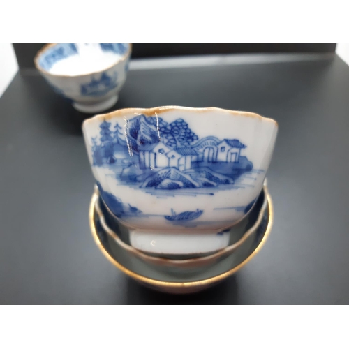 108 - Four 19th century blue and white tea bowls, three having gilded rims