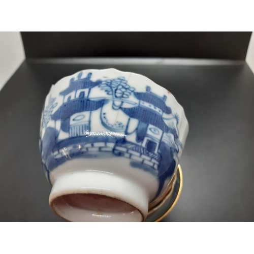 108 - Four 19th century blue and white tea bowls, three having gilded rims