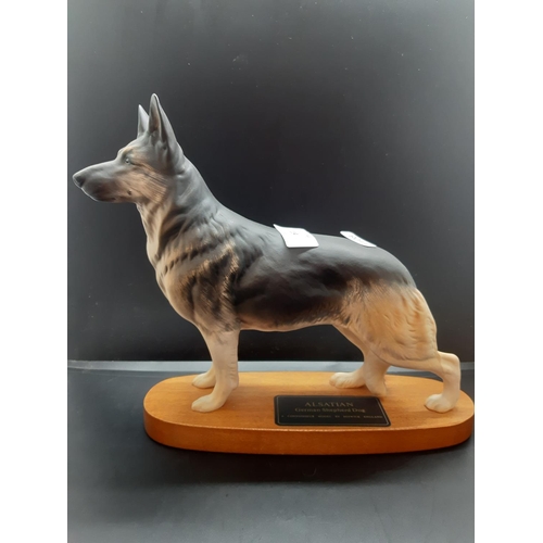 114 - A Beswick Alsatian German shepherd dog connoisseur model on wooden plinth - approx. 22cm high