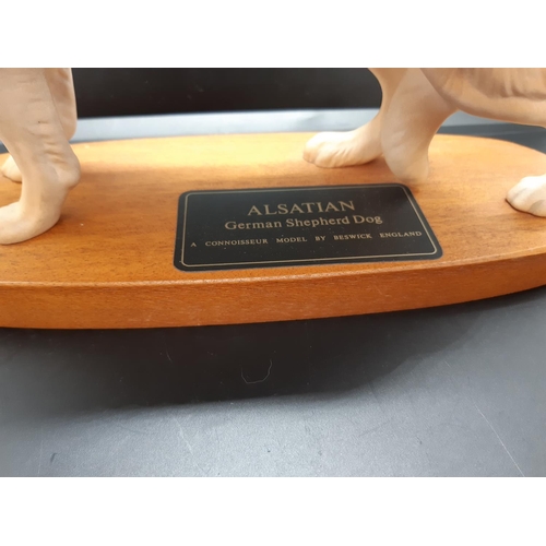 114 - A Beswick Alsatian German shepherd dog connoisseur model on wooden plinth - approx. 22cm high
