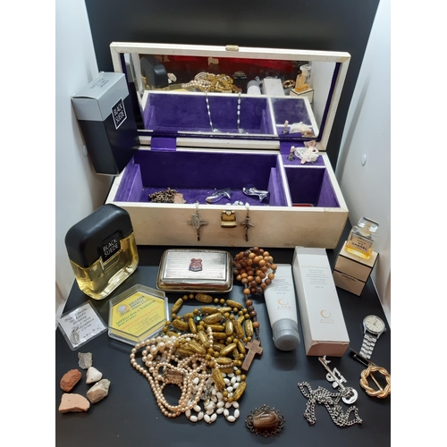 94 - A jewellery box containing costume jewellery, a boxed vintage Chanel No. 5 perfume, Sekonda nurses w... 