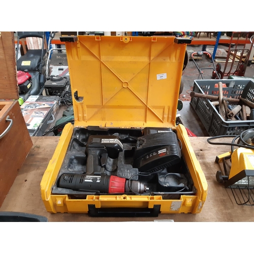 1237 - A cased Atlas Copco PBS3000 18v cordless drill with two 18v batteries and Atlas Copco RC Universal 7... 