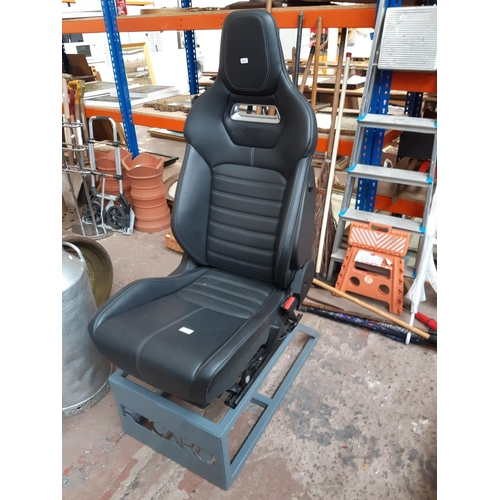 1294 - A black leather Evoque electric front seat with side airbag on grey Recaro base