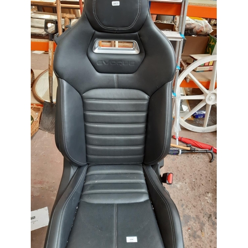 1294 - A black leather Evoque electric front seat with side airbag on grey Recaro base