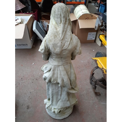 1298 - A cast stone Virgin Mary garden ornament - approx. 28