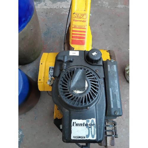 1299 - A black and yellow AL-KO farmer MH5001R petrol rotavator