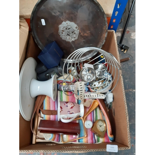 1303 - Four boxes and two suitcases containing glassware, vintage drill, brass alarm clock, Bosch steam iro... 