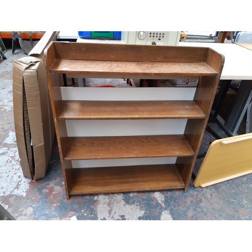 1311 - Eight pieces of small furniture to include wooden milking stool, pine bookcase, small display cases ... 