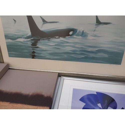 1320 - A mixed lot of framed pictures and photographs to include Brother Wolf, canvases, killer whales etc.