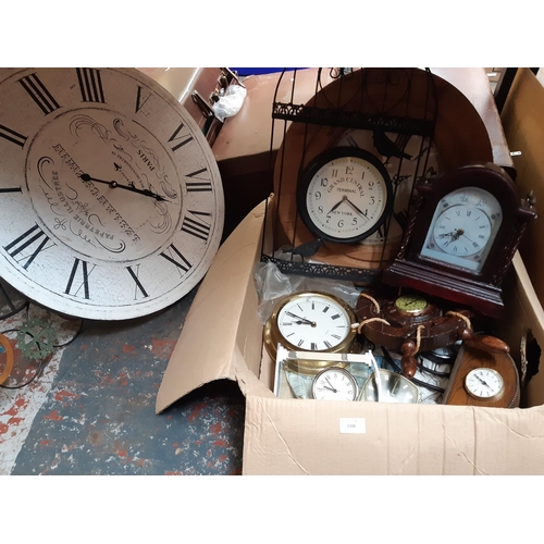 1330 - A box containing brass wall clock, ships wheel thermometer, wooden mantel clock etc.