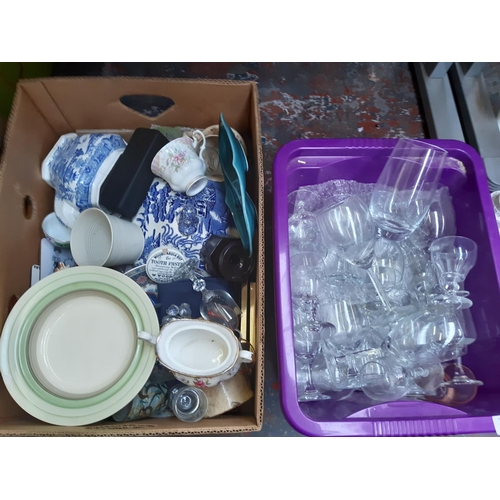 1346 - Seven boxes containing glassware, porcelain table lamp, ceiling lights, china etc.