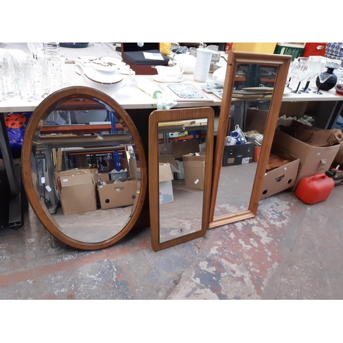 1367 - Three various mirrors, one pine framed rectangular, one 1970s teak framed and one oak framed bevelle... 