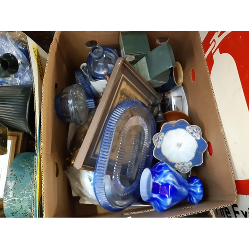 1391 - Three boxes and a suitcase containing pictures, crockery, candlesticks, blue glassware etc.