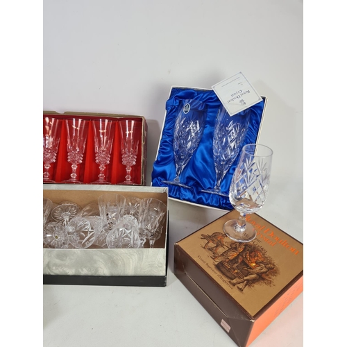 299 - A collection of assorted glassware to include a boxed pair of Royal Doulton Stratford finest crystal... 