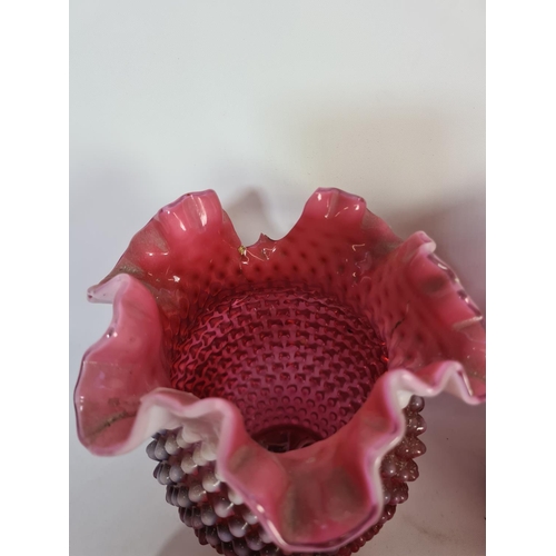 305 - A collection of assorted cranberry glassware