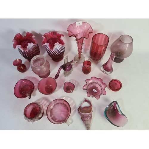 305 - A collection of assorted cranberry glassware