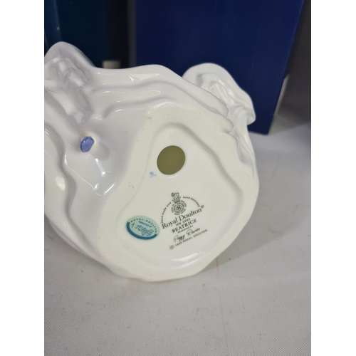 311 - Three boxed Royal Doulton figurines to include one Loyal Friend - HN3358, Pauline - HN3643 and Beatr... 