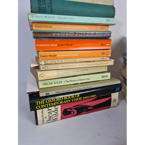 339 - A large collection of assorted books to include authors John Steinbeck, Susan Hill, Arthur Miller et... 
