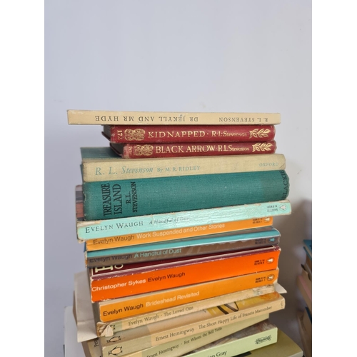 339 - A large collection of assorted books to include authors John Steinbeck, Susan Hill, Arthur Miller et... 