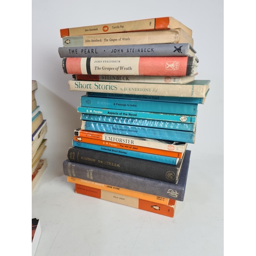 339 - A large collection of assorted books to include authors John Steinbeck, Susan Hill, Arthur Miller et... 