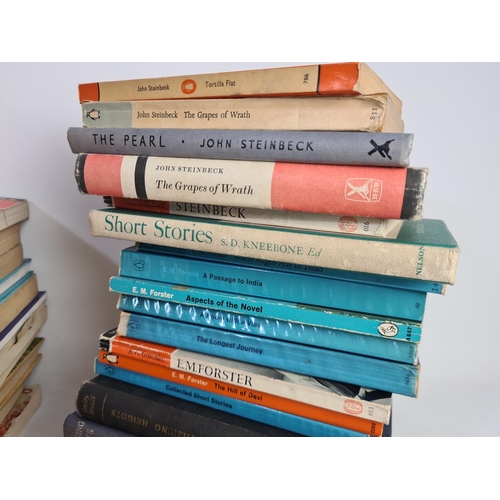 339 - A large collection of assorted books to include authors John Steinbeck, Susan Hill, Arthur Miller et... 