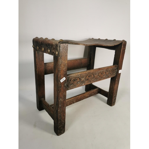 301 - A vintage carved oak and brown leather stool - approx. 46cm high x 48cm wide x 29cm deep