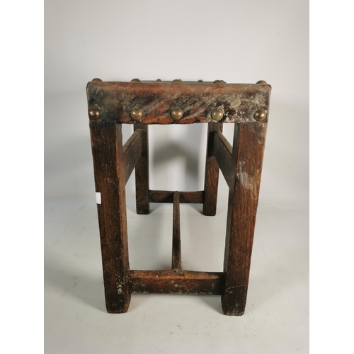 301 - A vintage carved oak and brown leather stool - approx. 46cm high x 48cm wide x 29cm deep