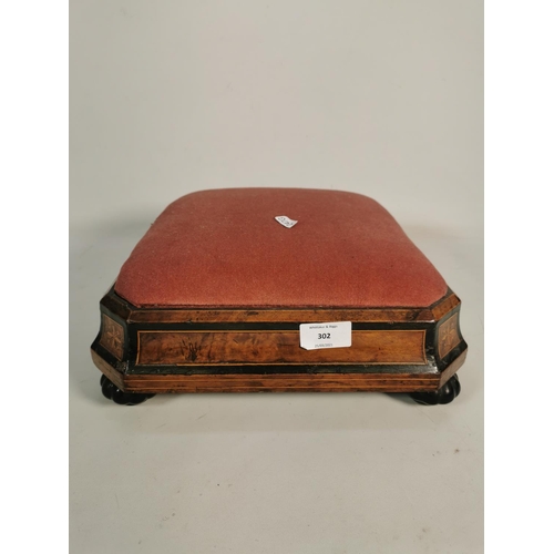 302 - A Victorian inlaid burr walnut footstool with red upholstery - approx. 13cm high x 31cm square