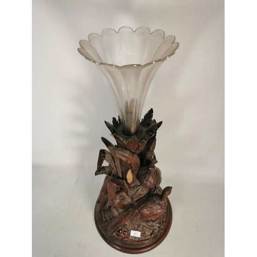 303 - A vintage glass fluted vase with heavily carved oak pheasant design base - approx. 73cm high