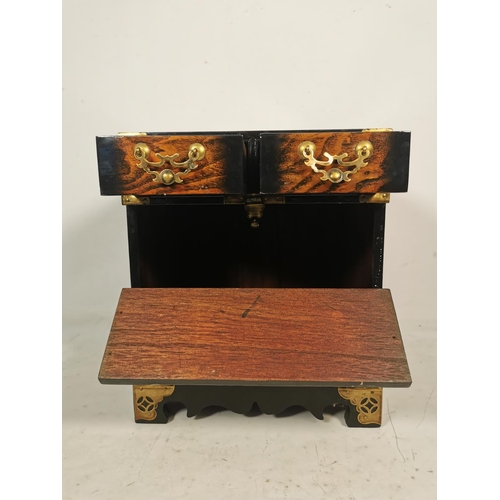 312 - A Korean elm miniature bandaji chest with two upper drawers, fall front and brass fittings - approx.... 