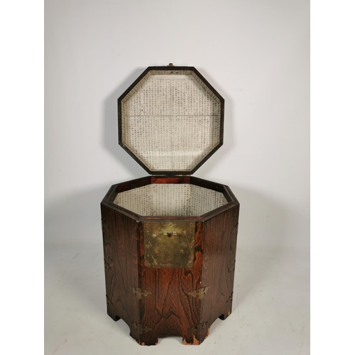 316 - A Korean elm octagonal lidded box with brass fittings and lock - approx. 43cm high x 37cm wide x 37c... 