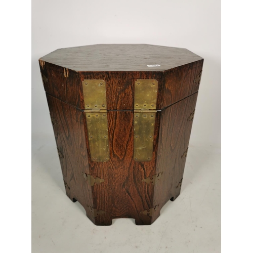 316 - A Korean elm octagonal lidded box with brass fittings and lock - approx. 43cm high x 37cm wide x 37c... 