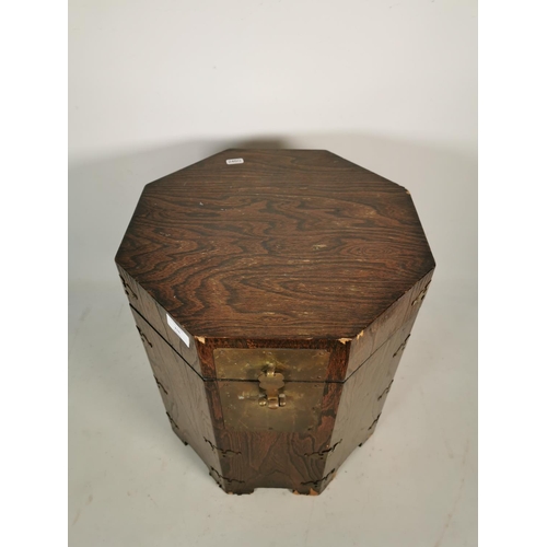 316 - A Korean elm octagonal lidded box with brass fittings and lock - approx. 43cm high x 37cm wide x 37c... 